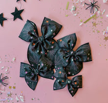 Load image into Gallery viewer, Black colorful spiderwebs bow
