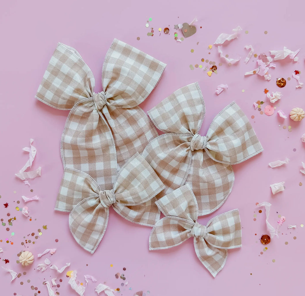 Beige checkered bow