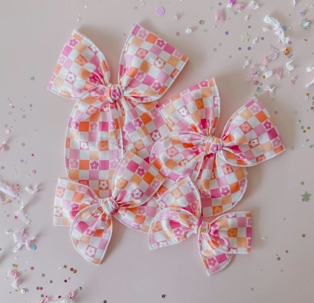 Pink and orange checkered bow