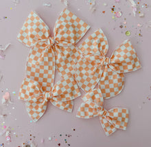 Load image into Gallery viewer, Orange and beige checkered bow
