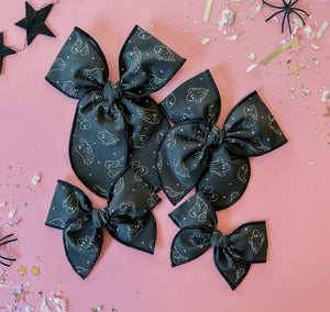 Black with ghost bow