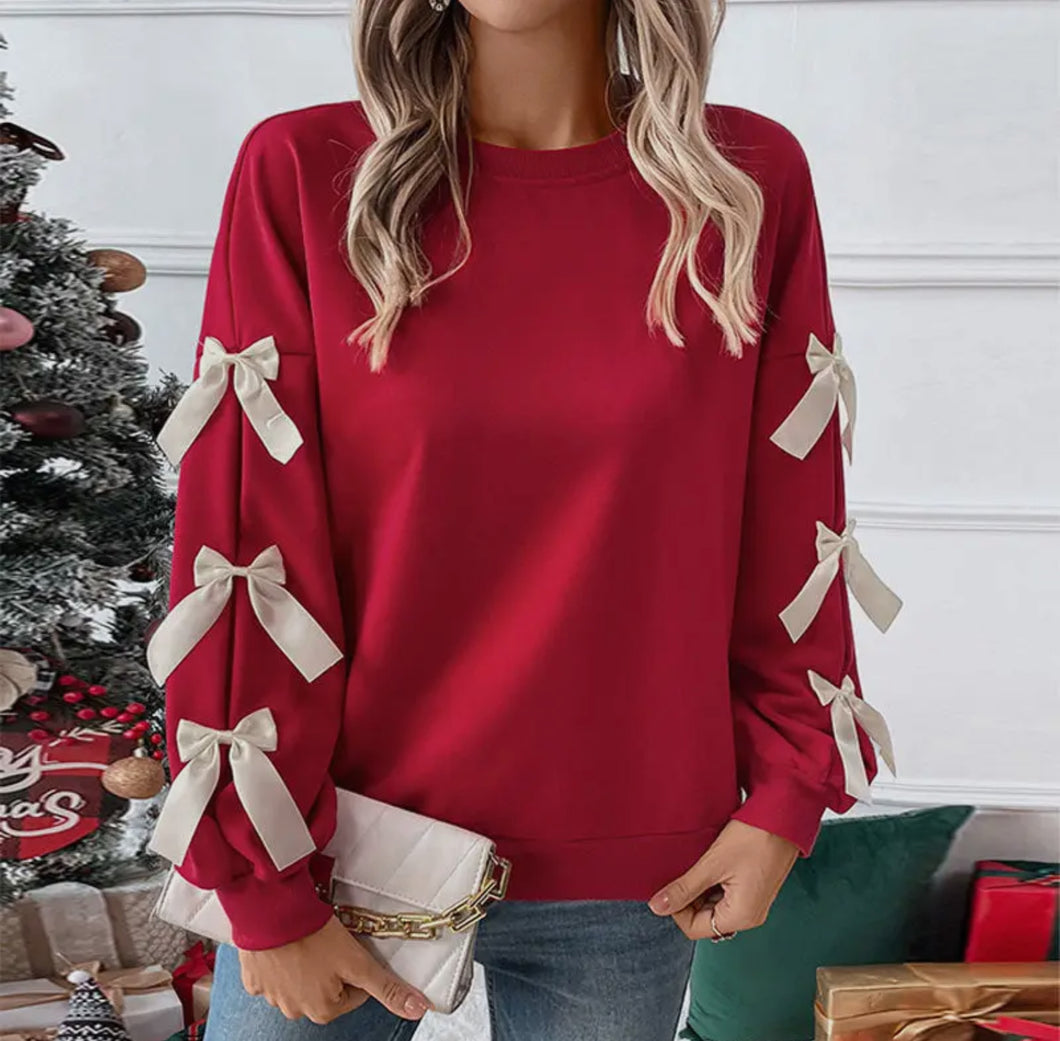 Red bow sleeve sweater