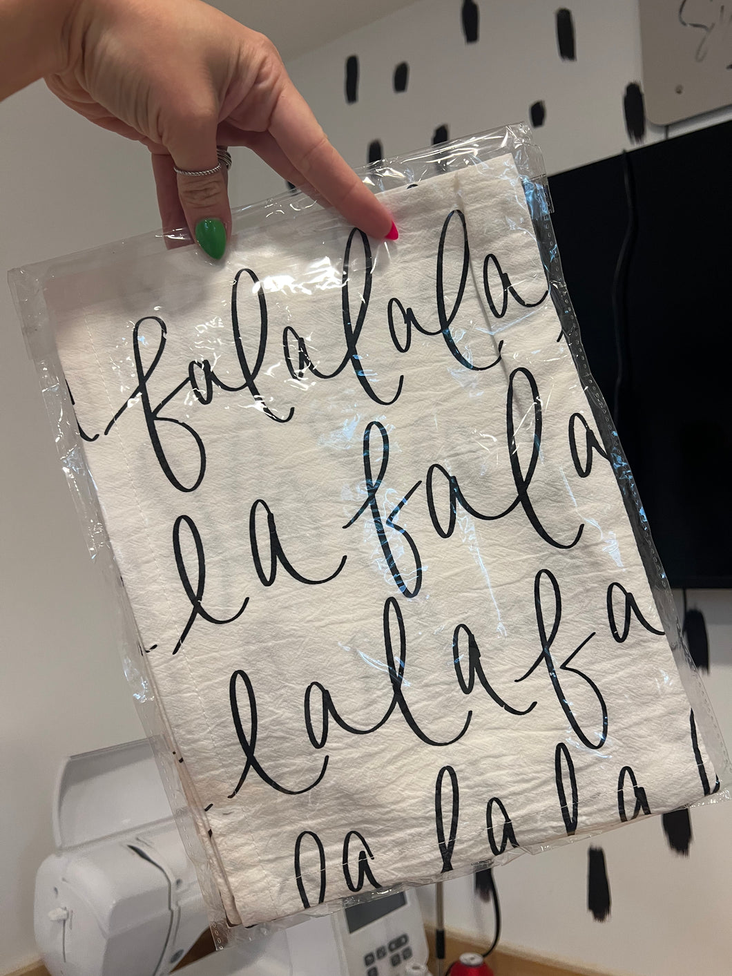 Fa la la la tea towel
